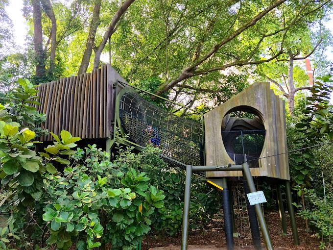children's playground made of wood surrounded by nature in the Jacob Ballas Children's Garden