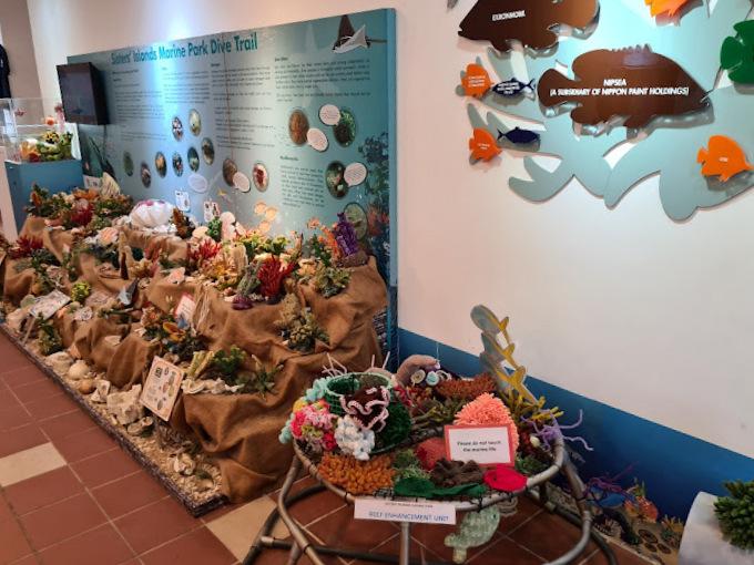 coral exhibits and educational display signs at St John’s Island’s Marine Park Outreach and Education Centre