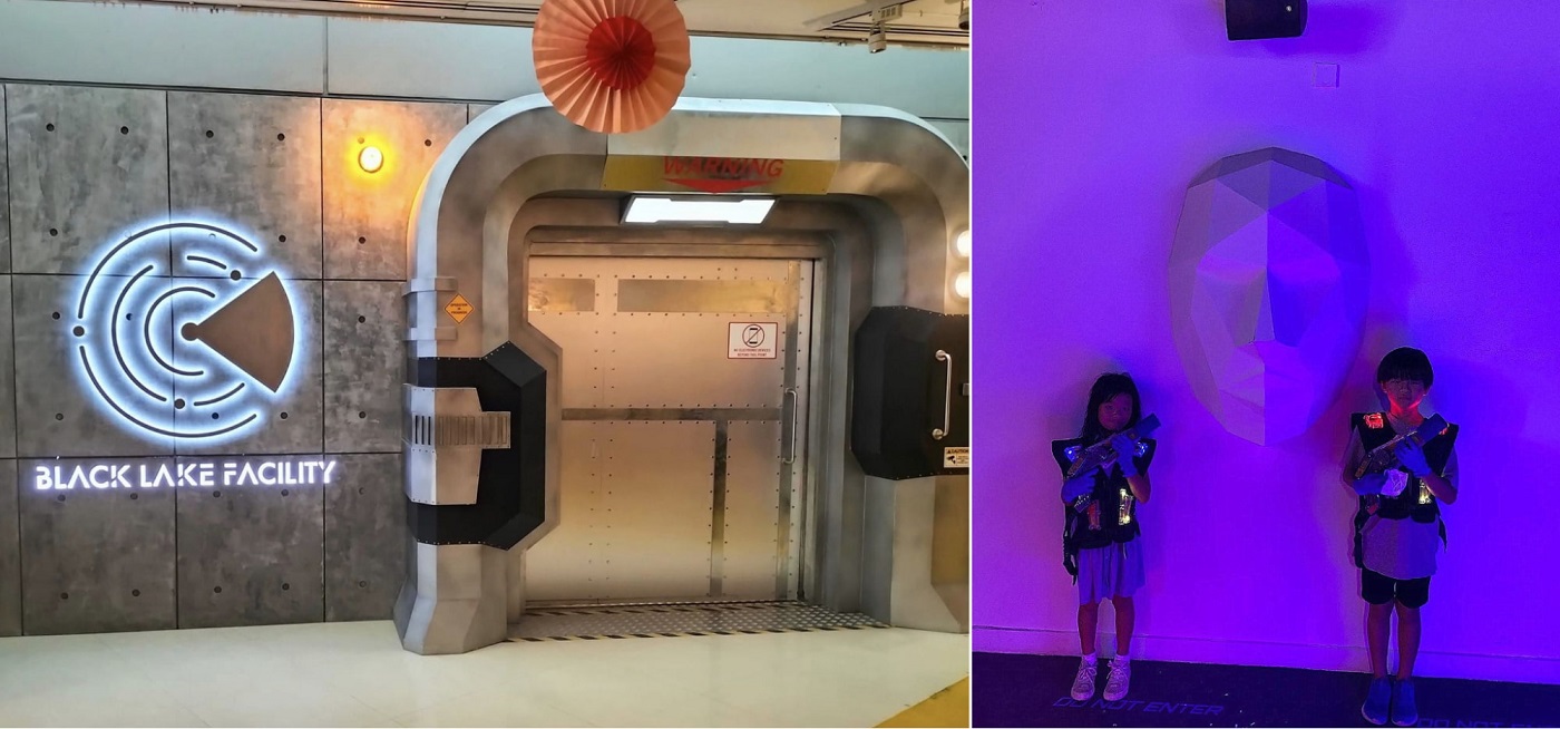 the entrance of the singapore discovery centre's black lake facility escape room, and two children posing with laser tag guns